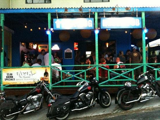 The Dog House Pub exterior patio with bikes outside